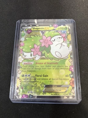 JCC Pokémon Shaymin EX XY148 Generaciones Holo Estrella Negra Tarjeta Promocional SELLADA Foto 1 de 4