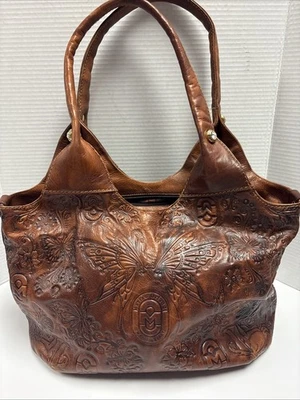 Bolsa CONHAQUE MARINO ORLANDI couro italiano BORBOLETA EM RELEVO estilingue conversível - Imagem 1 de 4