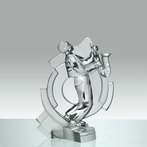 Escultura de vidrio transparente de mediados del siglo XX ""Músico de jazz con saxofón"" de Sèvres - Imagen 1 de 9