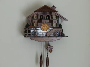 Traditional Black Forest Cuckoo Clock German Design Wood Chopper  Musical Quartz - Picture 1 of 13