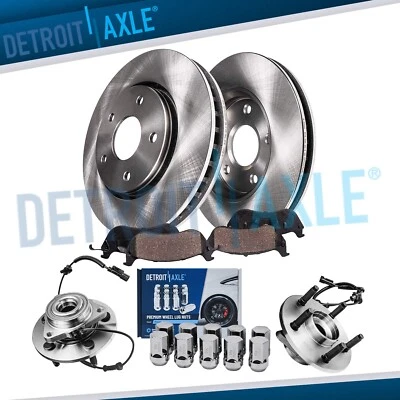 Rotores de disco delanteros pastillas de freno bujes de rueda + 10 piezas tuercas para Dodge Ram 1500 2006-09 Foto 1 de 4