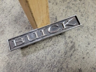 1975 Buick Century / Skylark " BUICK " Grille Emblem 1247574 - Image 1 of 4