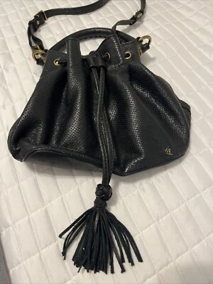 ELLIOT LUCCA DRAWSTRING CROSSBODY BAG. BLACK PERFORATED LEATHER Tassels Handle - Image 1 of 4