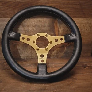 Vtg Dino Racing Steering Wheel Italy Nuova Raid Gold Tone Alloy & Black Leather - Imagen 1 de 21
