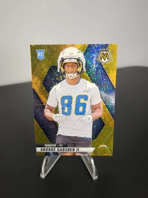 2025 Mosaic Gold Glitter Oronde Gadsden II RC 3/5 - Cargadores Foto 1 de 4