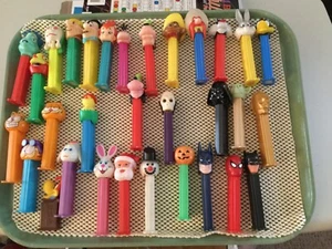 PEZ DISPENSERS Lot 31 vintage Disney Warner Bros Marvel Garfield Flintstones  - Picture 1 of 12