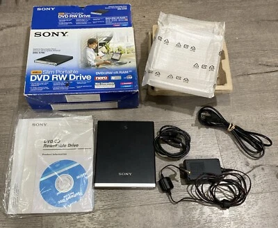 Sony DVD Rewritable Slim Portable Drive Model DRX-S70U W/ Adapters In Box - Image 1 of 4