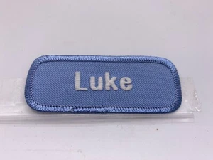 LUKE USED EMBROIDERED VINTAGE SEW ON NAME PATCH TAGS WHITE ON LIGHT BLUE 1 X 3 - Picture 1 of 2