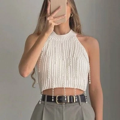 Top corto tejido cuello halter chenilla perlas colgantes Zara crema talla L Foto 1 de 4