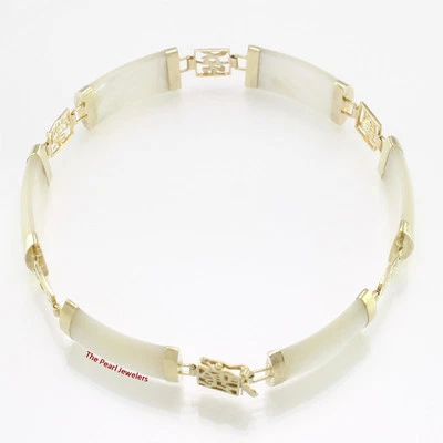 Cinco particiones de buena suerte de oro amarillo de 14k y seis segmentos de madreperla Foto 1 de 4