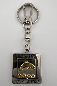 SeaWorld Dolphin Adventure Park Square Spinning Gold/Silver Tone Keychain - Picture 1 of 6