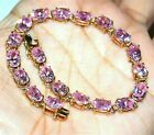 15Ct Oval Simulated Pink Sapphire Tennis Bracelet 14K Yellow Gold Plated Silver