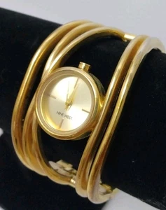 Nine West goldfarbene Uhr mit breitem Armreif ungeprüft - Bild 1 von 8