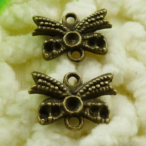 300 piezas conectores de moño enchapados en bronce 14X10MM S1475 HÁGALO USTED MISMO fabricación de joyas - Imagen 1 de 6