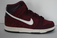 red nike shoes with leopard print