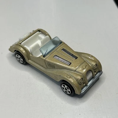 MAJORETTE MORGAN CUATRO PLAZAS 261 ORO METALIZADO 1:50 (FALTA TECHO) Foto 1 de 4