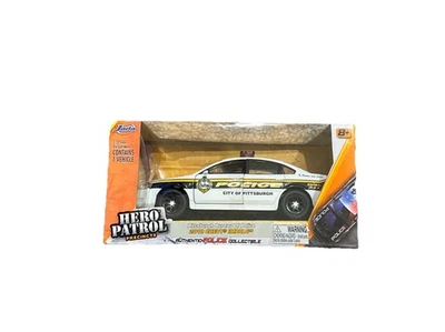 Jada Toys Hero Patrol Pittsburgh Bureau of Police 2010 Chevy Impala NIB 1:32 - Image 1 of 4