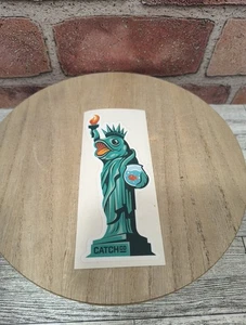 Catch Co Mystery Tackle Box Sticker Liberty Statue Mock Fish Bowl NEW - Picture 1 of 3