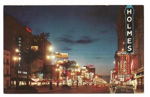 CANAL STREET AT NIGHT Lit Up New Orleans Louisiana LA Postcard Holmes Sutton's - Picture 1 of 2