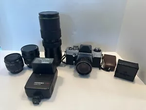 Praktica VLC 2 con 3 obiettivi, custodia rigida e accessori - Foto 1 di 24