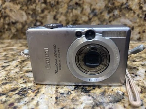 Cámara digital Canon PowerShot SD600 ELPH solo para piezas sin batería ni cargador - Imagen 1 de 5