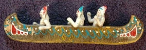 3 NATIVE AMERICAN FIGURES IN A 7" HAND PAINTED CANOE - Picture 1 of 4