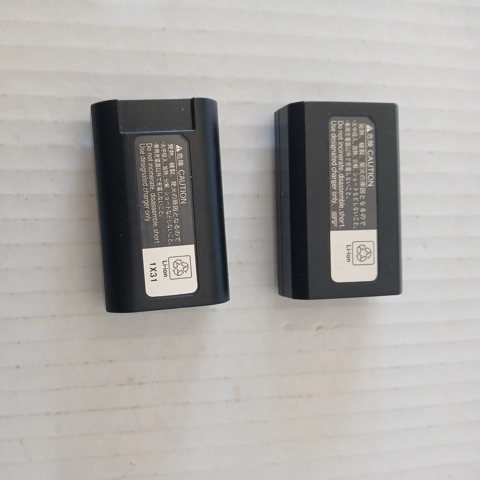 2 pilas RECARGABLES ORIGINALES OEM NIKON EN-EL1 PARA CÁMARA DE FOTOS (HECHAS EN JAPÓN)  Foto 1 de 4
