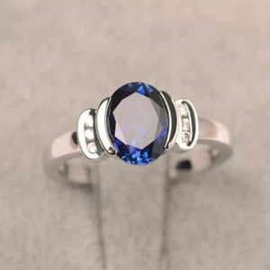 Alianza de boda de zafiro azul simulado de corte ovalado de 2,25 quilates enchapada en oro blanco de 14 k - Imagen 1 de 5