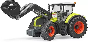 Claas Axion 950 with Frontloader - Picture 1 of 5