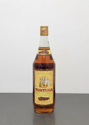Rum Tortuga 1980s Gold Rum Banana Cayman Islanda bott.. 1 litro 30% - Immagine 1 di 4