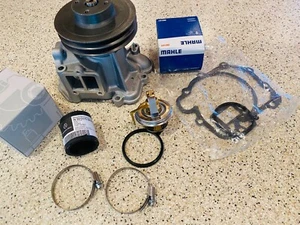 BOMBA DE AGUA MERCEDES BENZ W107 W126 380SL 380SE 300SEC 500SEC CON TERMOSTATO - Imagen 1 de 6