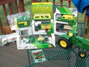 NIB JOHN DEERE DIE CAST TOY - TRACTOR - BANK - LOT  - LG PLAYED W/ TRACTOR - Picture 1 of 12