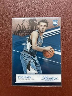 2015-16 Panini Prestige Acetate Rookie #18 Tyus Jones RC Grizzlies - Image 1 of 2