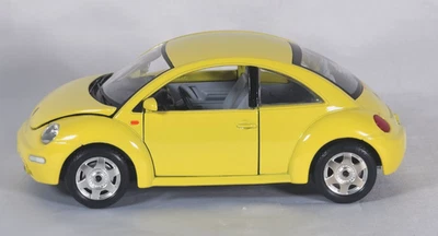 Coche fundido a presión Burago - 1998 VOLKSWAGEN NUEVO ESCARABAJO - escala 1:24 - amarillo Foto 1 de 4