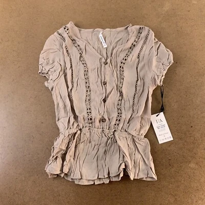 Top peplum manga corta detalle ganchillo topo talla pequeña Icon Apparel para mujer nuevo con etiquetas Foto 1 de 4