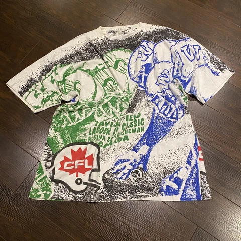 Vintage Blue Bombers Vs. Roughriders All Over Print T-Shirt One Size (XL) Banjo Cover