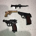 Charmes/jouets de pistolet en plastique vintage 