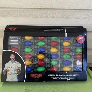 Luces de cadena Spirit Halloween Stranger Things a pilas funcionando - Imagen 1 de 6
