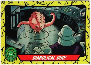 1989 Topps Teenage Mutant Ninja Turtles Card #62 - Diabolical Duo! - Picture 1 of 2