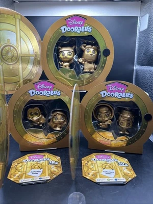 Disney Doorables Gold Peek 3 Juegos Par Dorado ULTRA RARO/RARO/COMÚN Foto 1 de 4