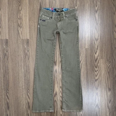 Jeans Adiktd para mujer 2/27 verde tiro bajo corte bota punto grueso adornado denim Foto 1 de 4