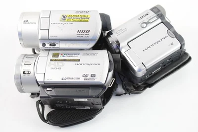 Vintage Handheld Video Cameras Inc Sony HDR-UX1E & Sony DCR-SR100E Working x 3 - Image 1 of 4