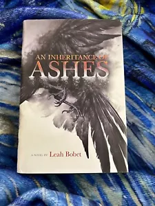 AN INHERITANCE OF ASHES LEAH BOBET HARDCOVER BRAND NEW ***FREE SHIPPING*** - Picture 1 of 2