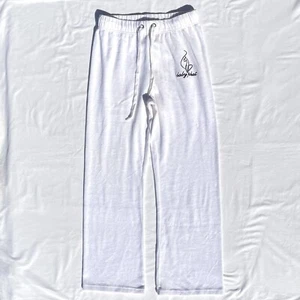 Pantalones de terciopelo vintage Y2K Baby Phat para mujer medianos blancos con cordón salón - Imagen 1 de 6
