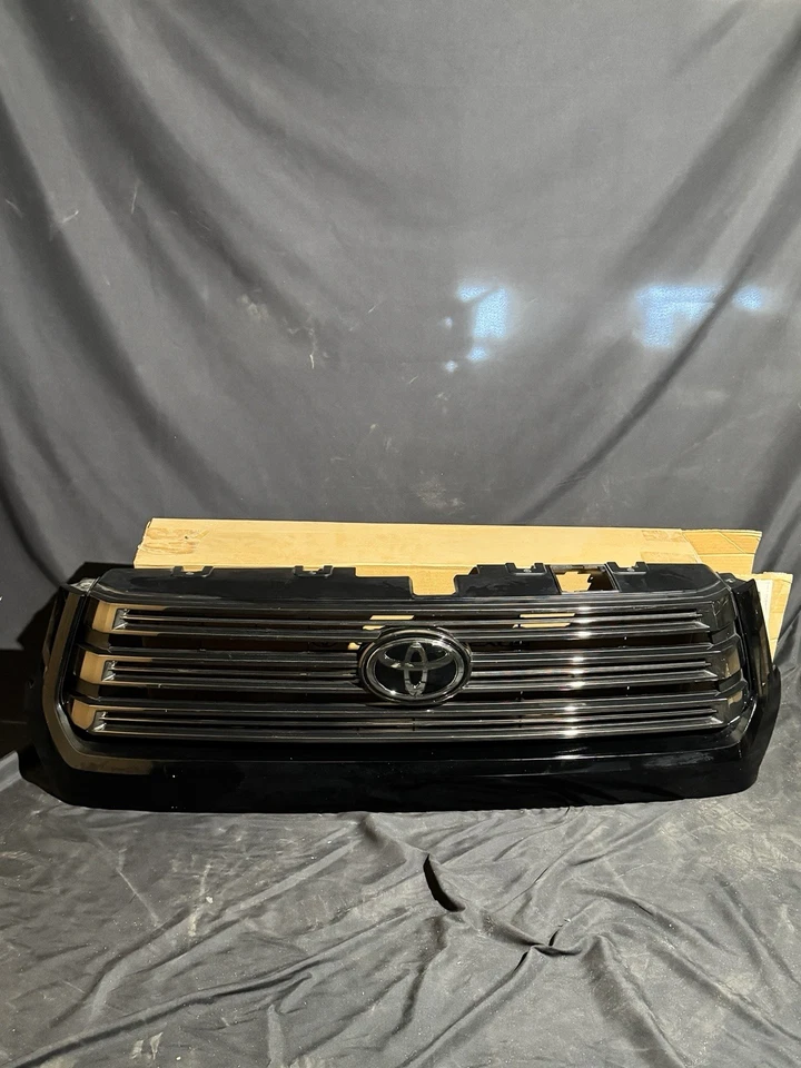 Toyota Tundra 2018-2021 OEM parrilla delantera emblema insignia negro Foto 1 de 4