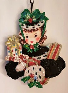 LITTLE GIRL w ARMS FULL OF WRAPPED GIFTS  * Glitter CHRISTMAS ORNAMENT * Vtg Img - Picture 1 of 1