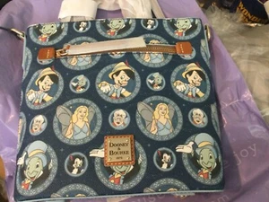Disney Pinocchio 85th Anniversary Dooney & Bourke Crossbody NWT OW SOLD OUT +FG - Picture 1 of 4