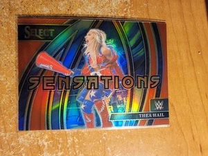 2024 Panini Select WWE - Sensations Thea Hail #7 Red Prizm  #62/99 - Bild 1 von 1