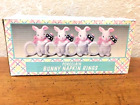 New Set Of 4 Porcelain Napkin Rings Easter Bunnies Holding Colored Eggs