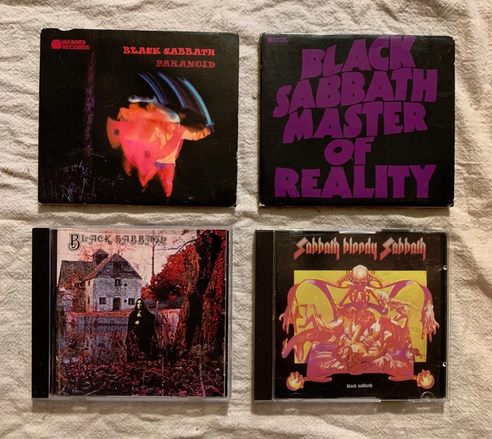 Лот товаров Black Sabbath 4 компакт-диска Paranoid Master of Reality одноименный Bloody Sabbath - Изображение 1 из 4